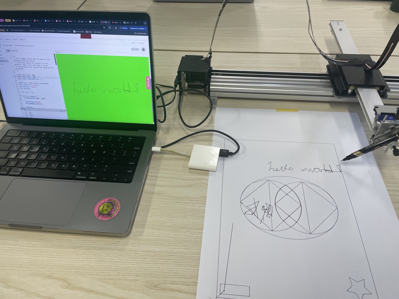 Hello world test drawn by AxiDraw from p5.js sketch