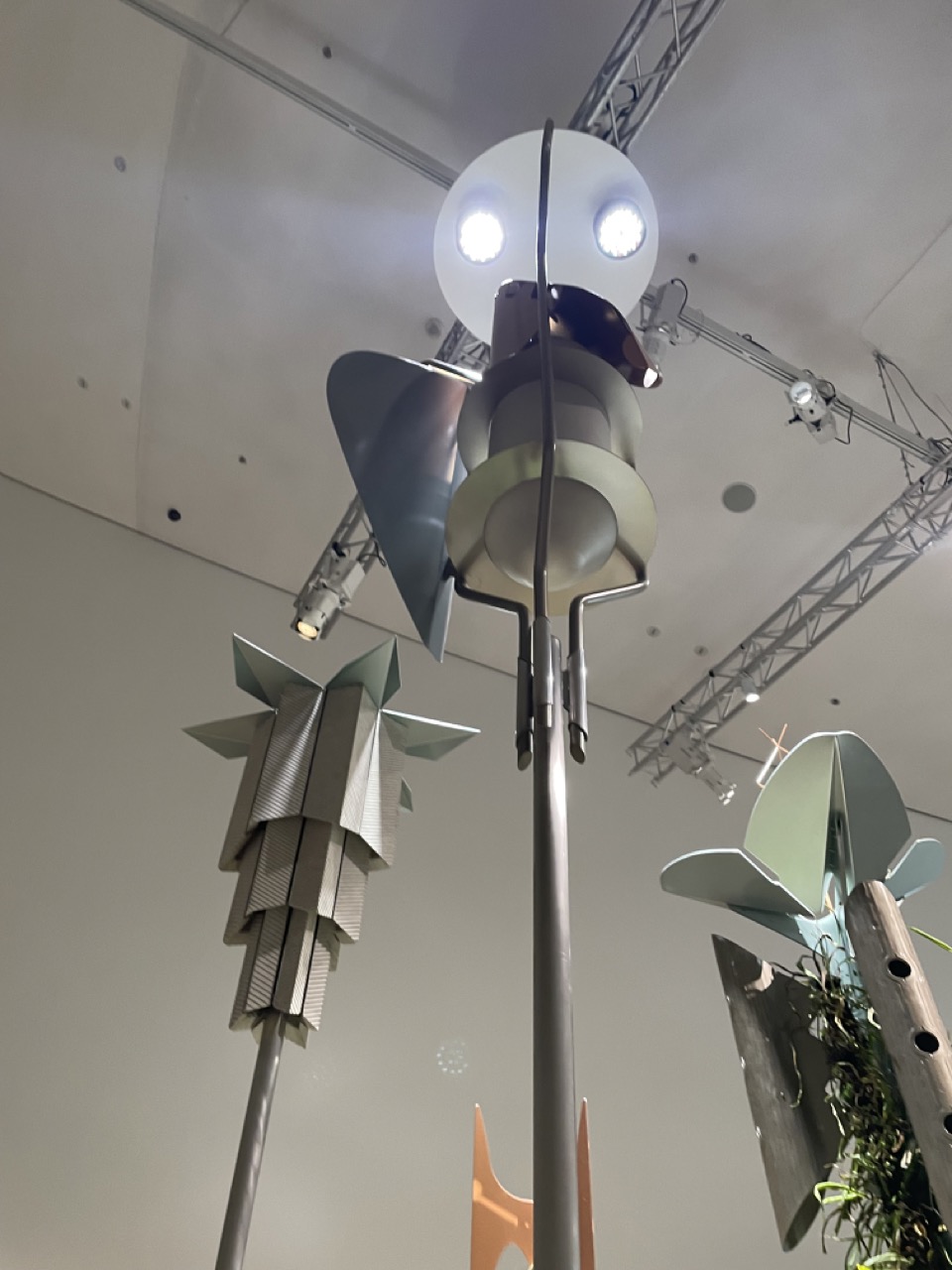 Series of habitat totems displayed in the gallery